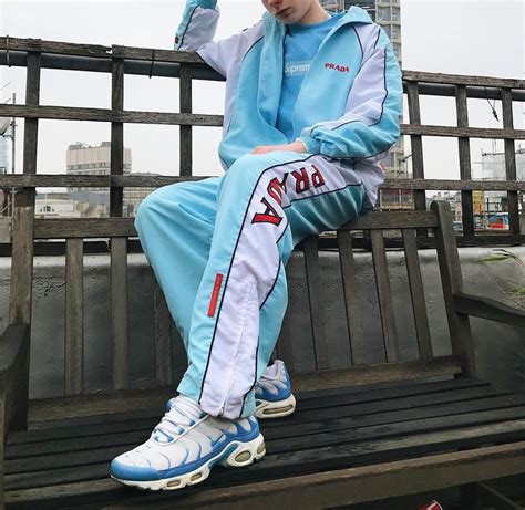 light blue track suit that says prada on leg|Prada .